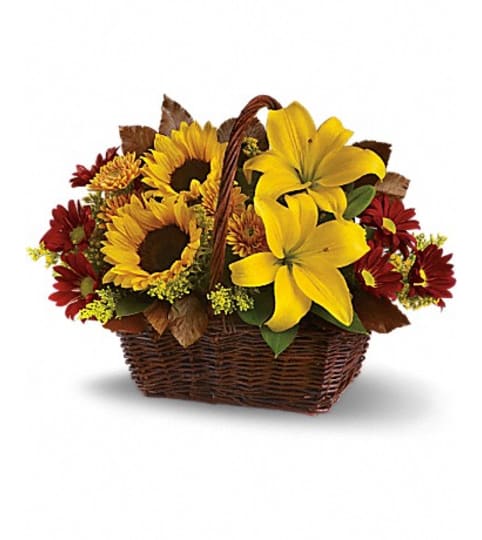 golden days basket. An arrangement by Fine's Flowers.