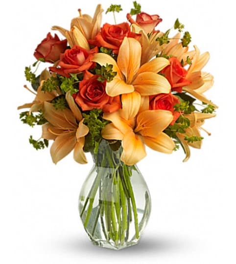 FIREY LILY AND ROSE. An arrangement by Fine's Flowers. FIREY LILY AND ROSE. An arrangement by Fine's Flowers.