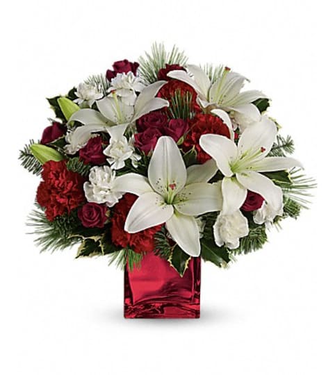 CAROLING IN THE SNOW. An arrangement by Fine's Flowers. CAROLING IN THE SNOW. An arrangement by Fine's Flowers.