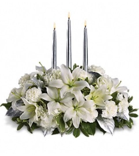 Luxurious white blooms. An arrangement by Fine's Flowers.