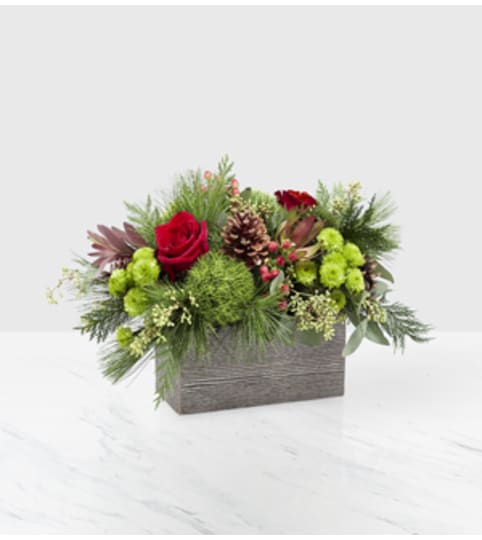 Christmas Cabin. An arrangement by Fine's Flowers.