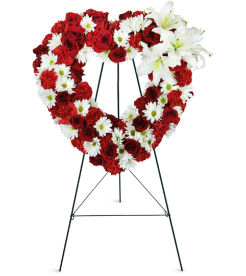 Rosy Remembrance Heart Wreath™. An arrangement by Fine's Flowers. Rosy Remembrance Heart Wreath™. An arrangement by Fine's Flowers.
