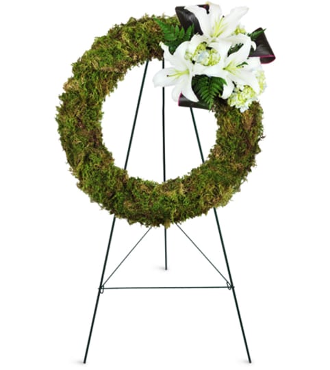 Earth's Jewel Wreath™. An arrangement by Fine's Flowers. Earth's Jewel Wreath™. An arrangement by Fine's Flowers.