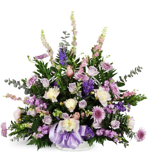 Love's Twilight Sympathy Basket™. An arrangement by Fine's Flowers.