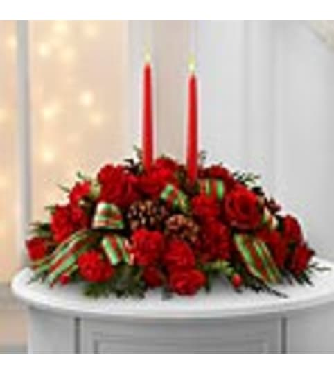 classic candles. An arrangement by Fine's Flowers.