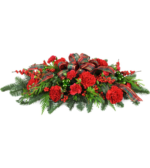 Christmas Traditions Centerpiece™. An arrangement by Fine's Flowers.