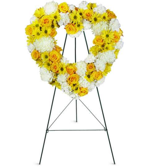 Love is Golden Heart™. An arrangement by Fine's Flowers. Love is Golden Heart™. An arrangement by Fine's Flowers.