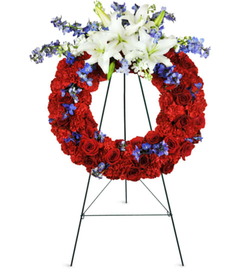 Passionate Grace Wreath™. An arrangement by Fine's Flowers. Passionate Grace Wreath™. An arrangement by Fine's Flowers.