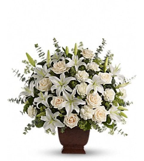 LOVING LILIES AND ROSES. An arrangement by Fine's Flowers. LOVING LILIES AND ROSES. An arrangement by Fine's Flowers.