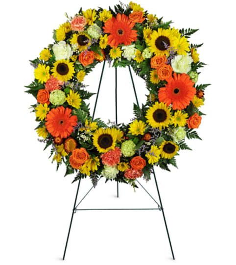 Heavenly Dawn Sunflower Wreath™. An arrangement by Fine's Flowers. Heavenly Dawn Sunflower Wreath™. An arrangement by Fine's Flowers.