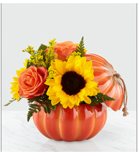 PUMPKIN PARTY BOUQUET. An arrangement by Fine's Flowers.