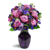 Lovely Lavender™ - Deluxe. An arrangement by Fine's Flowers. Sweet lavender roses are cheerfully displayed with alstroemeria, asters, stock, and...