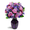 Lovely Lavender™ - Premium. An arrangement by Fine's Flowers. Sweet lavender roses are cheerfully displayed with alstroemeria, asters, stock, and...
